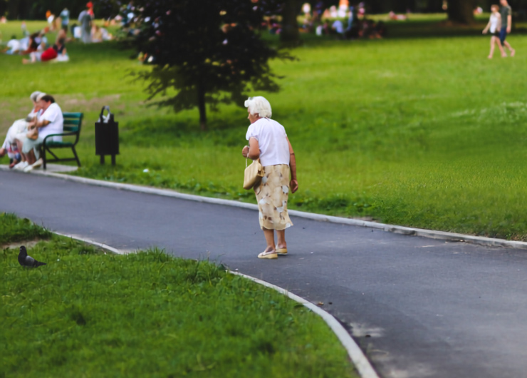 senior woman walking outside